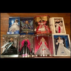 8 Collectable Barbies. All in original packaging.